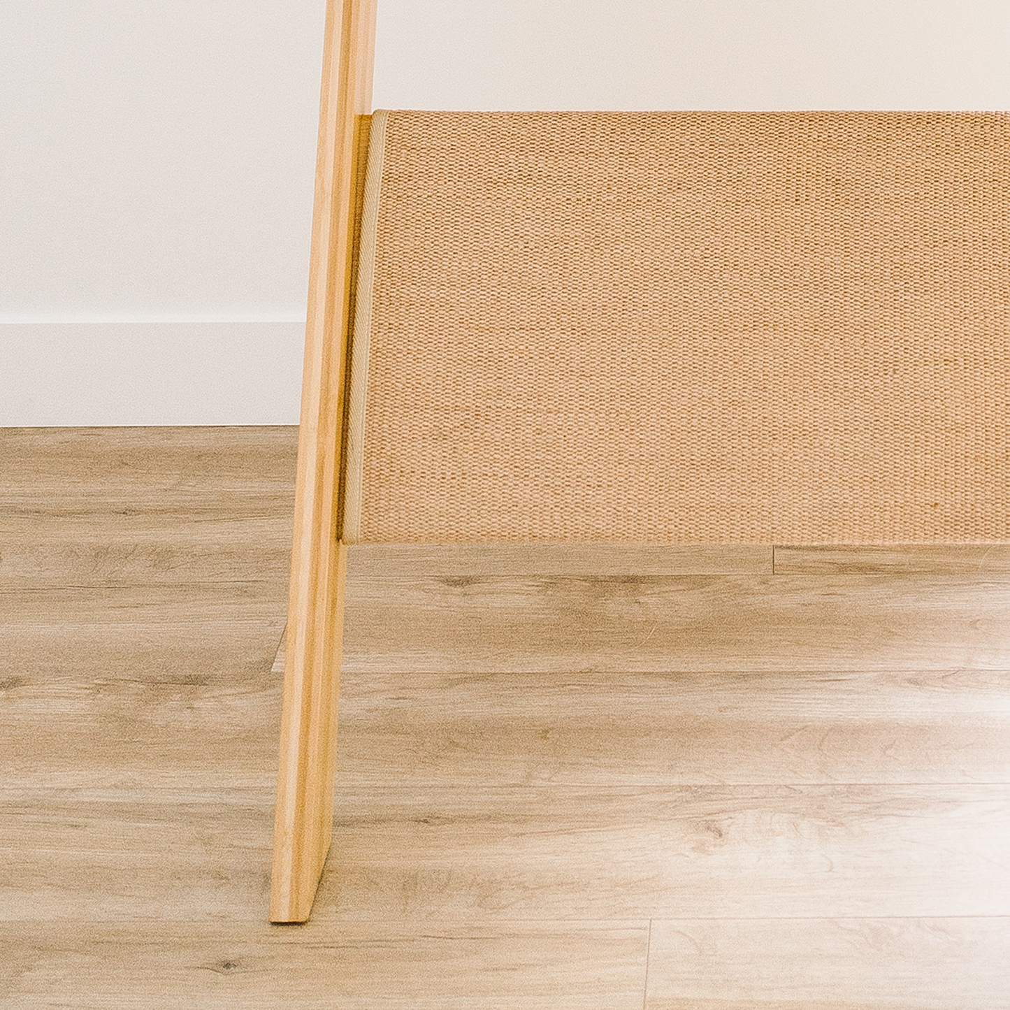 multi-story modern cat tree with accessories, beige wood