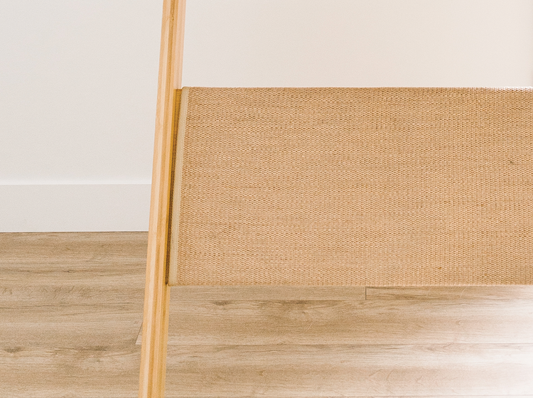 multi-story modern cat tree with accessories, beige wood