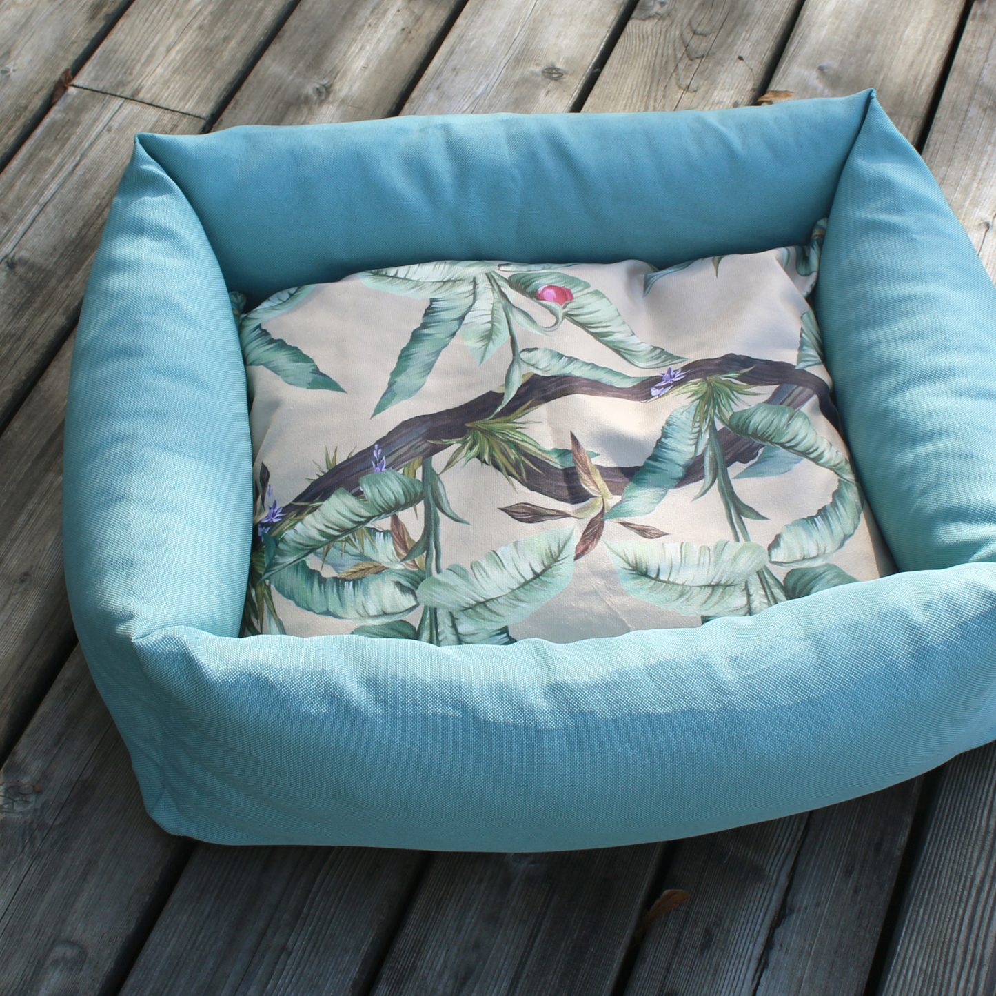 Memory foam pet bed with padded sides, turquoise