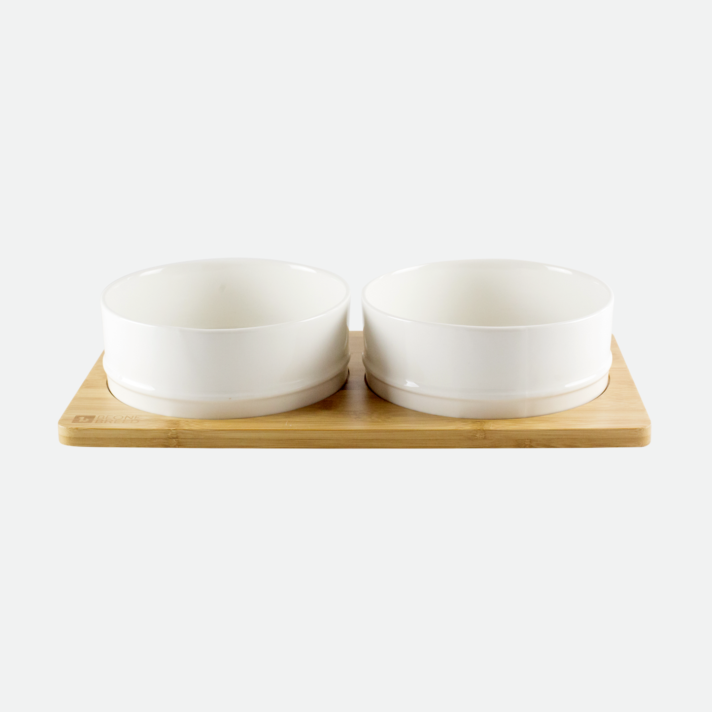 Ceramic bowls on bamboo plate for pet, white